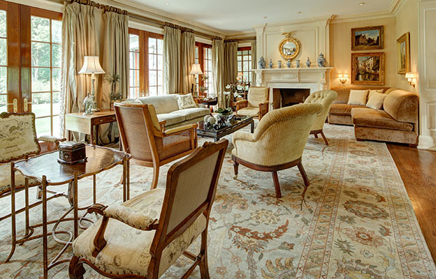 The sunny living room looks out onto the main view from the back of the house.