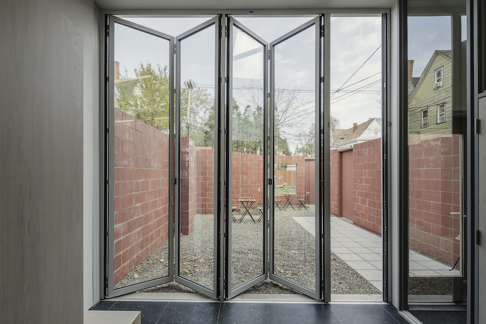 "catio" of cat cafe with sliding glass doors