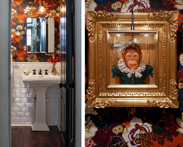 a busy floral wallpaper in oranges and blues covers the bathroom in a rittenhouse square townhouse