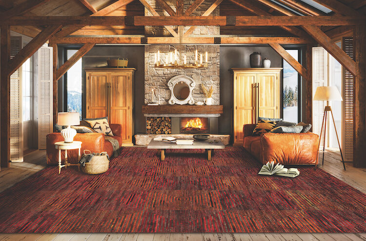 Interior of a living room in winter cottage. Digitally generated image of luxurious living room in modern style with sofas by the fireplace in the log house.